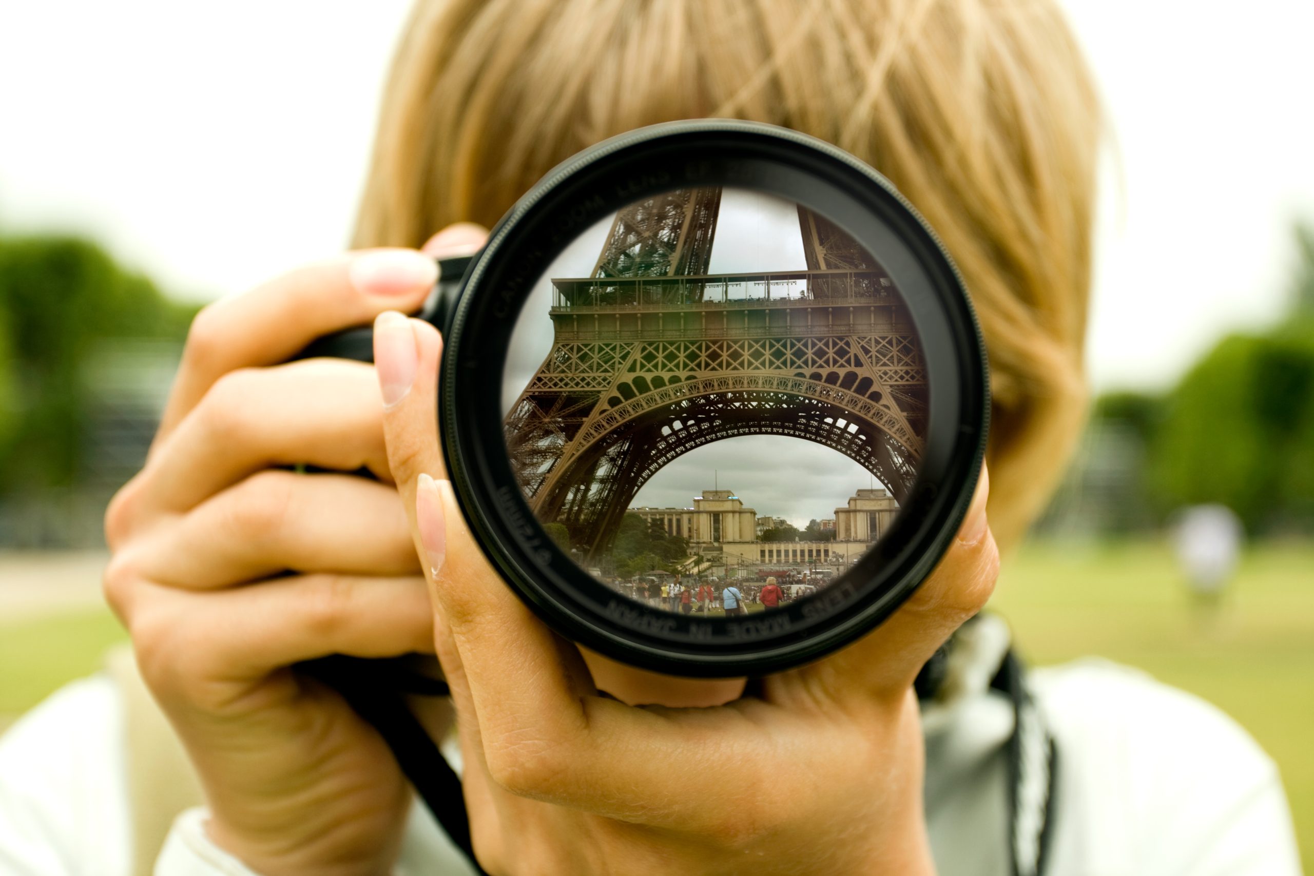 Eiffel tower reflection in camera lenses